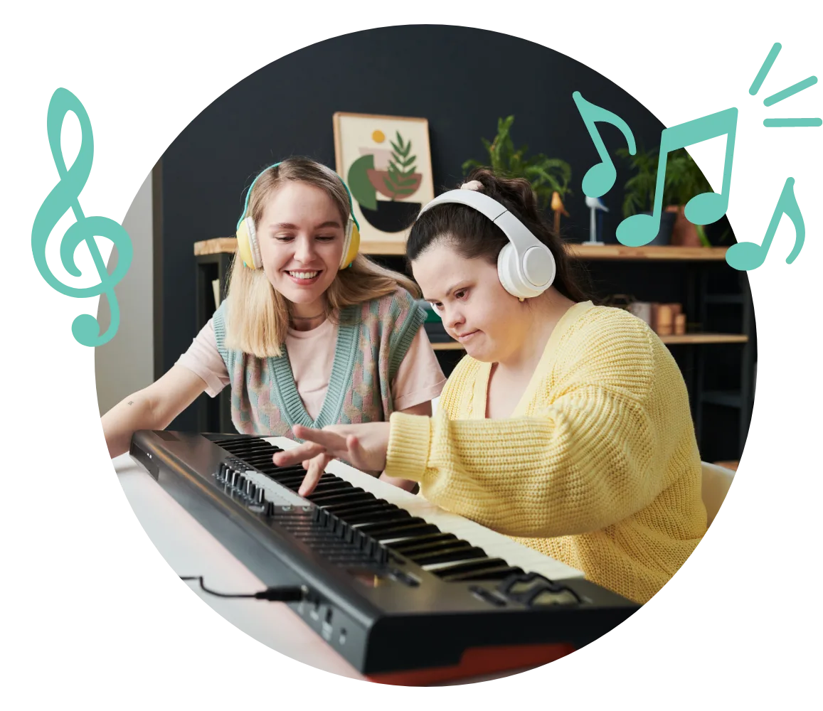Teacher and Student at the Keyboard Smiling teacher and student, both wearing headphones, playing a digital keyboard together