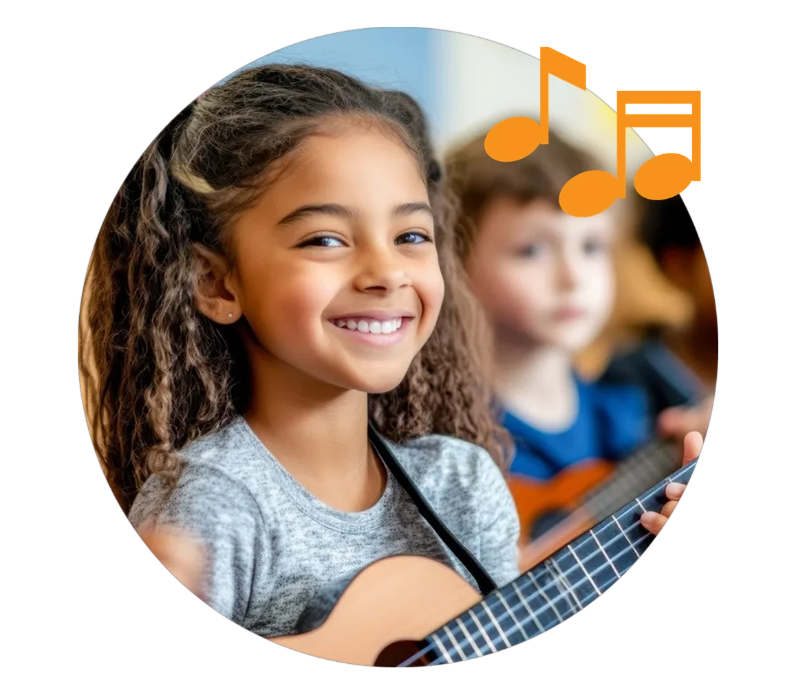Group Classes A smiling girl holding a ukulele in a group music class, a classmate with a ukulele blurred behind her
